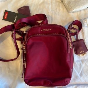 Tumi voyager crossbody bag.  New with tag.